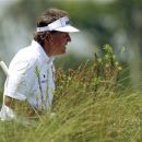 Phil Mickelson walks between the second and third holes during the final round of the PGA Championship golf tournament on the Ocean Course of the Kiawah Island Golf Resort in Kiawah Island, S.C., Sunday, Aug. 12, 2012. (AP Photo/John Raoux)