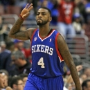 Philadelphia 76ers' Dorell Wright reacts after scoring against the Denver Nuggets in the first half of an NBA basketball game, Wednesday, Oct. 31, 2012, in Philadelphia. (AP Photo H. Rumph Jr)
