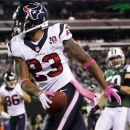 Houston Texans running back Arian Foster (23) celebrates after rushing for a touchdown during the first half of an NFL football game against the New York Jets, Monday, Oct. 8, 2012, in East Rutherford, N.J. (AP Photo/Kathy Willens)
