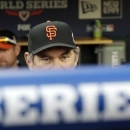 San Francisco Giants manager Bruce Bochy watches batting practice from dugout before Game 3 of baseball's World Series against the Detroit Tigers Saturday, Oct. 27, 2012, in Detroit. (AP Photo/Patrick Semansky)