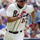 Atlanta Braves' Chipper Jones runs after singling to center field against the Houston Astros during the seventh inning of their baseball game at Turner Field, Sunday, Aug. 5, 2012, in Atlanta. The Braves won 6-1. (AP Photo/David Tulis)