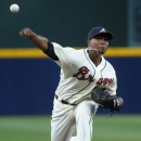 Atlanta Braves starting pitcher Julio Teheran delivers to the San Francisco Giants during the first inning of their baseball game at Turner Field, Sunday, June 16, 2013, in Atlanta. (AP Photo/David Tulis)