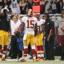 The Washington Redskins sideline including head coach Mike Shanahan, right, reacts after wide receiver Joshua Morgan (15) picked up an unsportsmanlike conduct penalty for throwing the ball at an opposing player during the fourth quarter action against the St. Louis Rams in an NFL football game on Sunday, Sept. 16, 2012 at the Edward Jones Dome in St. Louis. (AP Photo/St. Louis Post-Dispatch, Chris Lee) EDWARDSVILLE INTELLIGENCER OUT; THE ALTON TELEGRAPH OUT