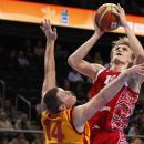 FILE - This Sept. 18, 2011 file photo shows Russia's Andrei Kirilenko going to the basket against a Macedonian defender during the European Basketball Championship bronze match against in Kaunas, Lithuania. The Minnesota Timberwolves have signed free agent Kirilenko, bringing the versatile forward back to the NBA after a one-season absence. (AP Photo/Mindaugas Kulbis, File)