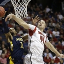 North Carolina A&T forward Adrian Powell (1) has his shot blocked by Louisville forward Stephan Van Treese (44) during the first half of a second-round game in the NCAA college basketball tournament, Thursday, March 21, 2013, in Lexington, Ky. (AP Photo/John Bazemore)