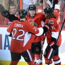 Ottawa Senators' Jean-Gabriel Pageau, center, celebrates a hat-trick against the Montreal Canadiens during the third period of Game 3 of their first-round NHL hockey Stanley Cup playoff series, Sunday, May 5, 2013, in Ottawa, Ontario. The Senators won 6-1. (AP Photo/The Canadian Press, Sean Kilpatrick)