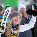 Lindsey Vonn, of the United States, celebrates at finish line after winning an alpine ski, women's World Cup giant slalom, in Maribor, Slovenia, Saturday, Jan. 26, 2013. (AP Photo/PierMarco Tacca)