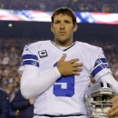 File- This Dec. 30, 2012 file photo shows Dallas Cowboys quarterback Tony Romo (9) standing during the national anthem before an NFL football game against the Washington Redskins in Landover, Md.  Romo and the Cowboys have agreed on a six-year contract extension worth $108 million, with about half of that guaranteed.  The agreement was reported on the team's website Friday March 29, 2013.  (AP Photo/Alex Brandon, File)