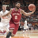 Indiana's Christian Watford (2) grabs a rebound in front of Illinois' Tyler Griffey (42) druing the first half of an NCAA college basketball game at Assembly Hall in Champaign, Ill., on Thursday, Feb. 7, 2013. (AP Photo/John Dixon)
