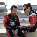 Michel Jourdain Jr. of Mexico, is comforted by a member of his crew after failing  to qualify on the second day of qualifications for the Indianapolis 500 auto race at the Indianapolis Motor Speedway in Indianapolis, Sunday, May 19, 2013. (AP Photo/Tom Strattman)