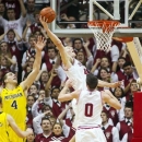 Indiana's Cody Zeller (40) takes a rebound back to the basket for a dunk against Michigan during the first half of an NCAA college basketball game Saturday, Feb. 2, 2013, in Bloomington, Ind. (AP Photo/Doug McSchooler)
