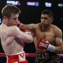 Boxing - Saul 'Canelo' Alvarez v Amir Khan WBC Middleweight Title - T-Mobile Arena, Las Vegas, United States of America - 7/5/16 Amir Khan in action against Saul Alvarez Action Images via Reuters / Andrew Couldridge  EDITORIAL USE ONLY.
