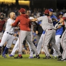 A scuffle breaks out after Los Angeles Dodgers starting pitcher Zack Greinke was hit by a pitch during the seventh  inning of their baseball game against the Arizona Diamondbacks, Tuesday, June 11, 2013, in Los Angeles.  (AP Photo/Mark J. Terrill)