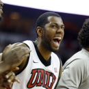 UNLV's Mike Moser reacts to a shot in the final moments of the second half of an NCAA college basketball game against Colorado State on Wednesday, Feb. 20, 2013, in Las Vegas. UNLV defeated Colorado State 61-59. (AP Photo/Isaac Brekken)