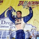 David Ragan celebrates after winning the NASCAR Sprint Cup Series Aaron's 499 auto race at Talladega Superspeedway in Talladega, Ala., Sunday, May 5, 2013. (AP Photo/Rainier Ehrhardt)
