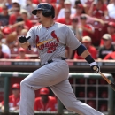 St. Louis Cardinals Allen Craig gets a hit against the Cincinnati Reds in the fifth inning in their baseball game in Cincinnati Monday Sept. 2, 2013. (AP Photo/Tom Uhlman)