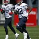 New England Patriots wide receiver Brandon Lloyd, left, and tight end Kellen Winslow (82) run on the field during a team practice at Gillette Stadium, in Foxborough, Mass., Wednesday, Sept. 19, 2012. The Patriots announced Wednesday that they signed Winslow. (AP Photo/Steven Senne)