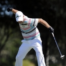 Tommy Gainey reacts after hitting a birdie putt on the 16th green during the final round of the McGladrey Classic PGA Tour golf tournament Sunday, Oct. 21, 2012 in St. Simons Island, Ga. (AP Photo/Stephen Morton)