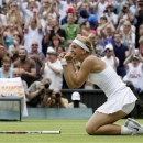 Sabine Lisicki of Germany reacts after beating Serena Williams of the United States in a Women's singles match at the All England Lawn Tennis Championships in Wimbledon, London, Monday, July 1, 2013. (AP Photo/Alastair Grant)