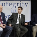 Basketball coaches Kevin Stallings, left, of Vanderbilt; Brad Stevens, center, of Butler; and Rick Byrd, right, of Belmont, take part in a panel on integrity in college basketball on Wednesday, April 10, 2013, in Nashville, Tenn. The coaches discussed maintaining integrity and honor in college sports' changing landscape with the ever-increasing pressure to win. (AP Photo/Mark Humphrey)