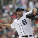 Detroit Tigers starting pitcher Justin Verlander throws during the first inning of a baseball game against the Washington Nationals in Detroit, Wednesday, July 31, 2013. (AP Photo/Carlos Osorio)