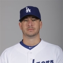 In this February 2010 photo, Los Angeles Dodgers' Justin Miller poses during photo day at the baseball team's spring training facility in Glendale, Ariz. Miller, a pitcher for four teams during a major league career that spanned seven seasons, has been found dead. He was 35. Miller's death was confirmed Friday, June 28, 2013, by his agent, Matt Sosnick. Miller's body was found Wednesday night, but the cause of death hadn't been released by the Pinellas County (Fla.) Sheriff's Office. (AP Photo/Mark Duncan)
