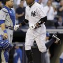 New York Yankees' Curtis Granderson runs past Kansas City Royals catcher Humberto Quintero after hitting a first-inning home run off Kansas City Royals starting pitcher Will Smith during their baseball game at Yankee Stadium in New York, Wednesday, May 23, 2012. (AP Photo/Kathy Willens)