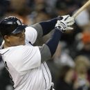 Detroit Tigers' Miguel Cabrera hits a solo home run against the New York Yankees in the fourth inning of a baseball game in Detroit, Saturday, June 2, 2012. (AP Photo/Paul Sancya)