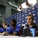Florida head coach Billy Donovan answers a question during a news conference for a regional final game in the NCAA college basketball tournament, Saturday, March 30, 2013, in Arlington, Texas. Florida faces Michigan in the final on Sunday. (AP Photo/David J. Phillip)