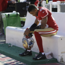 San Francisco 49ers cornerback Nnamdi Asomugha (28) sits on the bench during the fourth quarter of an NFL football game against the Indianapolis Colts in San Francisco, Sunday, Sept. 22, 2013. The Colts won 27-7. (AP Photo/Marcio Jose Sanchez)