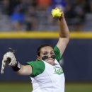 Oregon's Sheridan Hawkins pitches in the first inning against UCLA in an NCAA Women's College World Series softball game in Oklahoma City, Thursday, May 28, 2015. (AP Photo/Alonzo Adams)