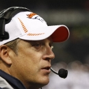 FILE - In this Aug. 9, 2012 file photo, Denver Broncos defensive coordinator Jack Del Rio watches the action during the second half of an NFL preseason football game against the Chicago Bears in Chicago. On Monday, Nov. 4, 2013, the Broncos named Del Rio as the teams interim head coach, Executive Vice President of Football Operations John Elway announced. Coach John Fox remained hospitalized Sunday as he awaits aortic valve replacement surgery in North Carolina. (AP Photo/Charles Rex Arbogast, File)