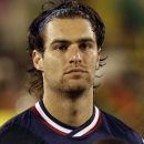 United States' Graham Zusi listens the national anthems before the start of the 2014 World Cup qualifying soccer match against Jamaica in Kingston, Jamaica, Friday, June 7, 2013. (AP Photo/Andres Leighton)