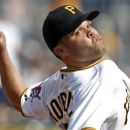 Pittsburgh Pirates starting pitcher Wandy Rodriguez throws against the Arizona Diamondbacks in the fourth inning of a baseball game on Thursday, Aug. 9, 2012, in Pittsburgh. (AP Photo/Keith Srakocic)