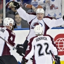 Colorado Avalanche's Greg Zanon, Cody McLeod and Matt Hunwick celebrate McLeod's goal against the Edmonton Oilers during the first period of an NHL hockey game in Edmonton, Alberta, on Saturday Feb. 16, 2013. (AP Photo/The Canadian Press, Jason Franson)