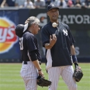 New York Yankees' Derek Jeter, right, talks with first base coach Mick Kelleher during batting practice before a baseball game against the Tampa Bay Rays Saturday, June 22, 2013, in New York. (AP Photo/Frank Franklin II)