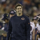 Chicago Bears' Jay Cutler smiles on the sidelines during the first half of an NFL football game against the Green Bay Packers Monday, Nov. 4, 2013, in Green Bay, Wis. (AP Photo/Jeffrey Phelps)