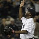 New York Yankees relief pitcher Rafael Soriano (29) looks skyward after the Kansas City Royals' Alcides Escobar hit into a ninth-inning groundout with a runner on third for the final out in the Yankees 3-2 victory over the Royals during a baseball game in New York, Tuesday, May 22, 2012. (AP Photo/Kathy Willens)