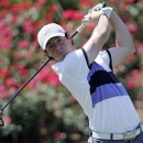 Rory McIlroy, of Northern Ireland, hits from the 18th tee during the first round of The Players championship golf tournament at TPC Sawgrass, Thursday, May 9, 2013 in Ponte Vedra Beach, Fla. (AP Photo/Gerald Herbert)