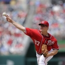 Washington Nationals starting pitcher Jordan Zimmermann delivers against the Minnesota Twins during the fourth inning of the first baseball game of a day-night interleague doubleheader on Sunday, June 9, 2013, in Washington. (AP Photo/Nick Wass)