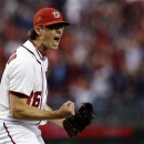 Washington Nationals relief pitcher Tyler Clippard reacts after striking out St. Louis Cardinals' Yadier Molina to the end top of the eighth inning of Game 4 of the National League division baseball series against the St. Louis Cardinals on Thursday, Oct. 11, 2012, in Washington. (AP Photo/Alex Brandon)