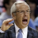 North Carolina head coach Roy Williams directs his team against Miami during the first half of an NCAA college basketball game in the championship of the Atlantic Coast Conference tournament in Greensboro, N.C., Sunday March 17, 2013. (AP Photo/Bob Leverone)