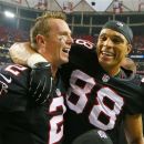Falcons quarterback Matt Ryan,left, and tight end Tony Gonzalez celebrate a 30-28 victory over the Carolina Panthers in an NFL football game at the Georgia Dome in Atlanta on Sunday, Sept. 30, 2012. (AP Photo/Atlanta Journal & Constitution, Curtis Compton)
