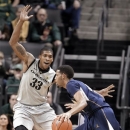 California guard Allen Crabbe, right, drives on Oregon forward Carlos Emory during the first half of an NCAA college basketball game in Eugene, Ore., Thursday, Feb. 21, 2013. (AP Photo/Don Ryan)
