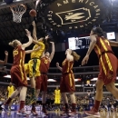 Baylor's Brittney Griner, third from left, shoots against Iowa State' Brynn Williamson (22), Anna Prins (55), Hallie Christofferson (5), Chelsea Poppens (33) and Nikki Moody (4) in the first half of their NCAA college basketball championship game in the Big 12 Conference tournament, Monday, March 11, 2013, in Dallas. (AP Photo/Tony Gutierrez)