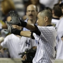 New York Yankees' Ichiro Suzuki acknowledges the crowd after hitting a walk-off home run against the Texas Rangers in the ninth inning ofa baseball game Tuesday, June 25, 2013, in New York. The Yankees won 4-3. (AP Photo/Kathy Willens)