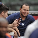 Suspended Detroit Tigers shortstop Jhonny Peralta jokes with teammates in the dugout after working out with theteam before an MLB baseball game against the Chicago White Sox in Chicago, Wednesday, Sept. 11, 2013. Peralta accepted a 50-game suspension from Major League Baseball on Aug. 5 as part of its investigation into Biogenesis of America, a Florida anti-aging clinic accused of distributing banned performance-enhancing drugs. (AP Photo/Paul Beaty)  