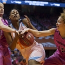 Tennessee's Bashaara Graves, center, is pressured by Vanderbilt's Heather Bowe, left, and Jasmine Jenkins during their NCAA college basketball game, Sunday, Feb. 17, 2013, in Knoxville, Tenn. (AP Photo/The Knoxville News Sentinel, Saul Young)