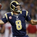 St. Louis Rams quarterback Sam Bradford throws during the first quarter of an NFL football game against the Arizona Cardinals, Thursday, Oct. 4, 2012, in St. Louis. (AP Photo/Jeff Roberson)