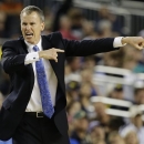 Florida Gulf Coast head coach Andy Enfield reacts to action against Florida during the second half of a regional semifinal game in the NCAA college basketball tournament, Saturday, March 30, 2013, in Arlington, Texas. (AP Photo/David J. Phillip)